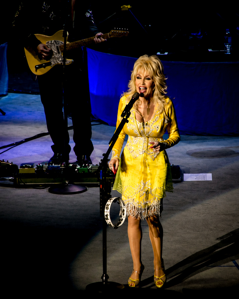 From the Archives: Rhinestones, Stories, and Stardom. Dolly Parton Brings Backwoods Barbie Charm to Des Moines | 11-19-2008